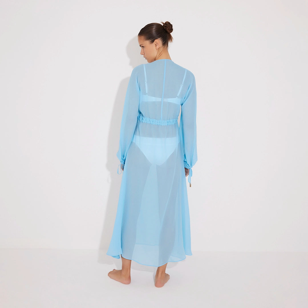 Lula Silk Blouson-Sleeve Belted Sheer Blue Maxi Dress | Moeva | Dress | Each week unveils new pieces—luxury swimwear, fluid resort silhouettes, and elevated summer-to-evening essentials designed to carry you from coastal escapes to city nights.