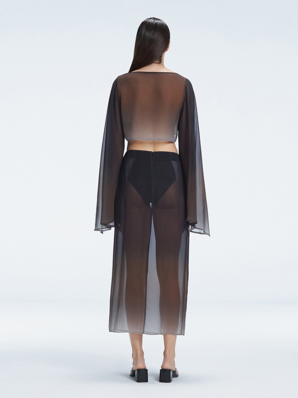 Tabitha Black Optical Maxi Skirt | Moeva | Skirt | Each week unveils new pieces—luxury swimwear, fluid resort silhouettes, and elevated summer-to-evening essentials designed to carry you from coastal escapes to city nights.