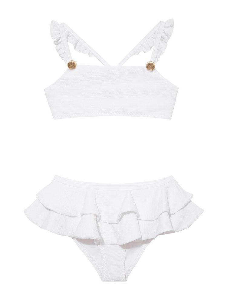 Dassy White Ruffle Strap Kids Bikini Set with Layered Skirt | Moeva | Bikini Set | Each week unveils new pieces—luxury swimwear, fluid resort silhouettes, and elevated summer-to-evening essentials designed to carry you from coastal escapes to city nights.