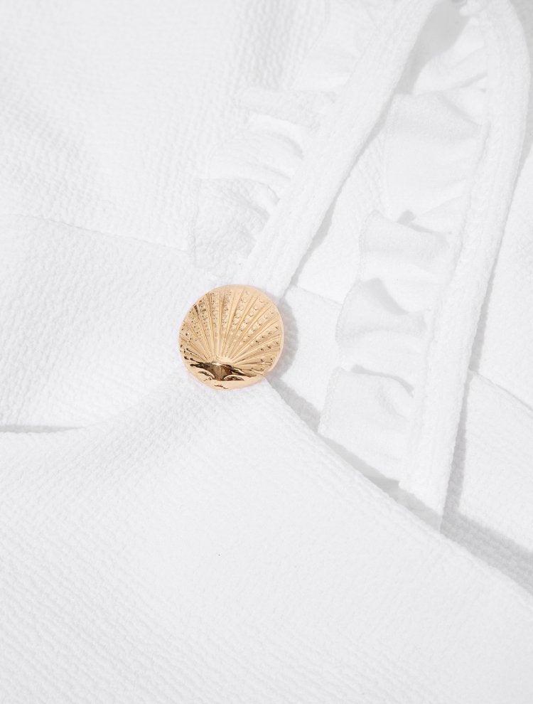 Dassy White Ruffle Strap Kids Bikini Set with Layered Skirt | Moeva | Bikini Set | Each week unveils new pieces—luxury swimwear, fluid resort silhouettes, and elevated summer-to-evening essentials designed to carry you from coastal escapes to city nights.