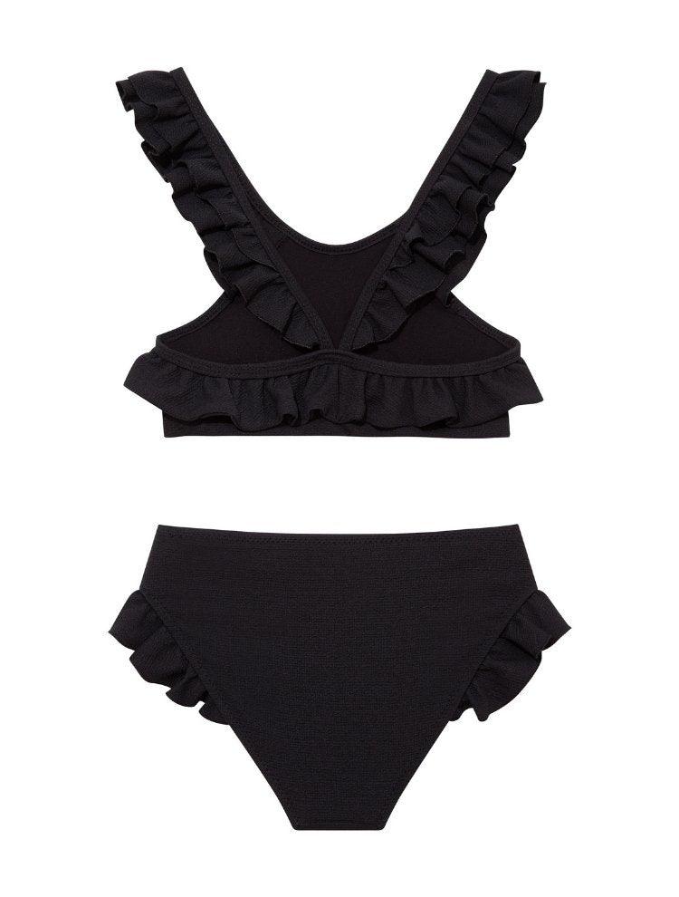 Effy Black Ruffle Strap and Trim Kids Bikini Set | Moeva | Bikini Set | Each week unveils new pieces—luxury swimwear, fluid resort silhouettes, and elevated summer-to-evening essentials designed to carry you from coastal escapes to city nights.