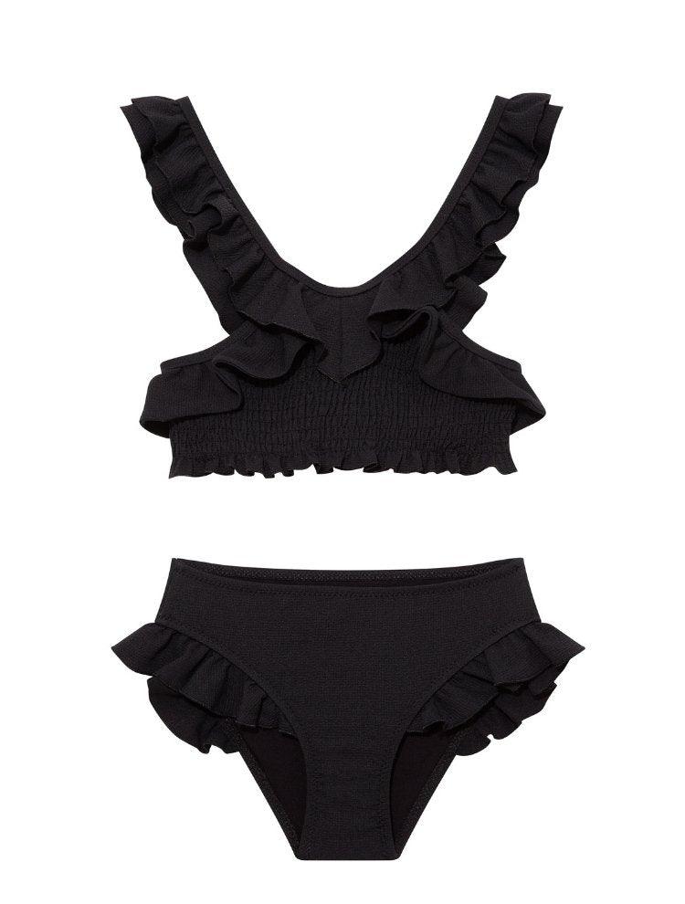 Effy Black Ruffle Strap and Trim Kids Bikini Set | Moeva | Bikini Set | Each week unveils new pieces—luxury swimwear, fluid resort silhouettes, and elevated summer-to-evening essentials designed to carry you from coastal escapes to city nights.
