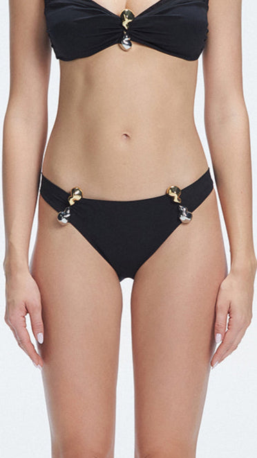 Emilia Black Mid Coverage Solid Bikini Bottom | Moeva | Bikini Bottom | Each week unveils new pieces—luxury swimwear, fluid resort silhouettes, and elevated summer-to-evening essentials designed to carry you from coastal escapes to city nights.