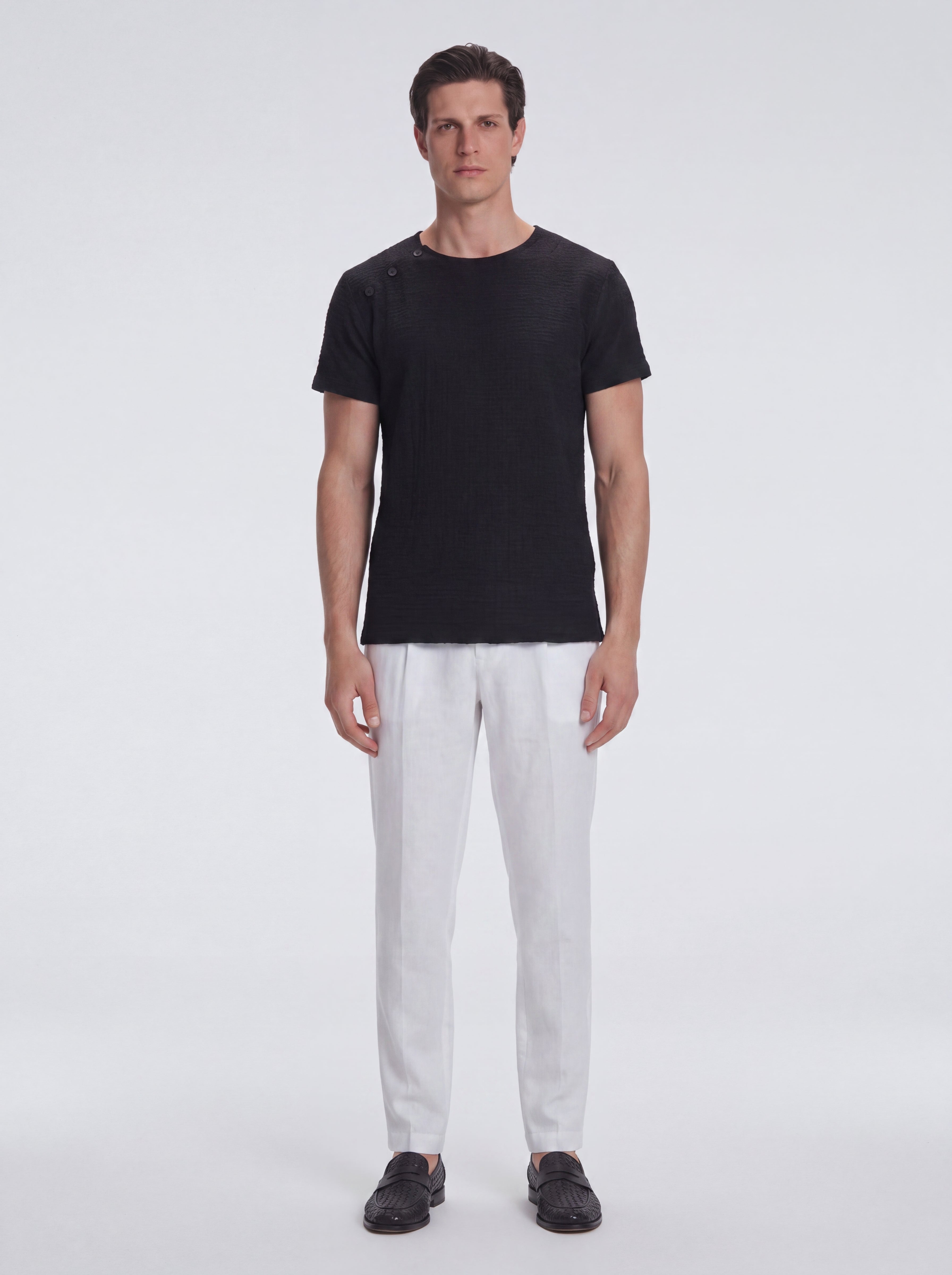 George Black Cotton T-Shirt with Button Detail | Moeva | T-Shirt | Each week unveils new pieces—luxury swimwear, fluid resort silhouettes, and elevated summer-to-evening essentials designed to carry you from coastal escapes to city nights.