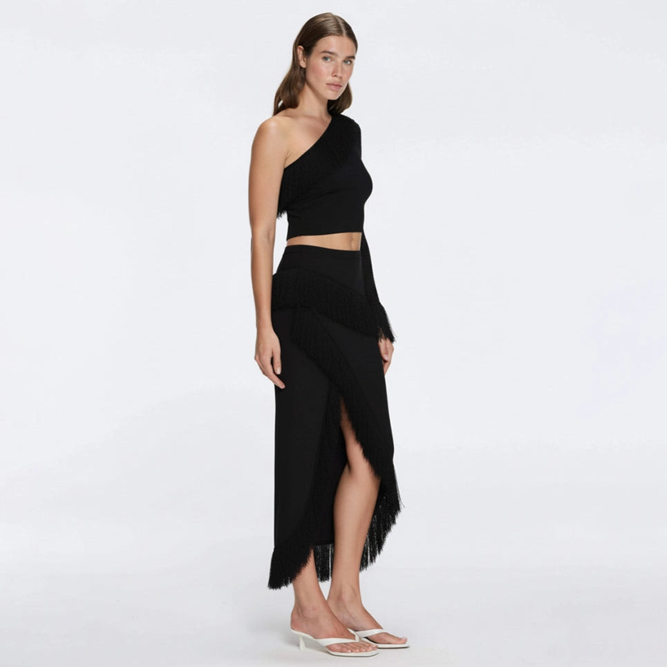Monroe & Alani Fringe Asymmetric Knit Black Set | Moeva | Set | Each week unveils new pieces—luxury swimwear, fluid resort silhouettes, and elevated summer-to-evening essentials designed to carry you from coastal escapes to city nights.
