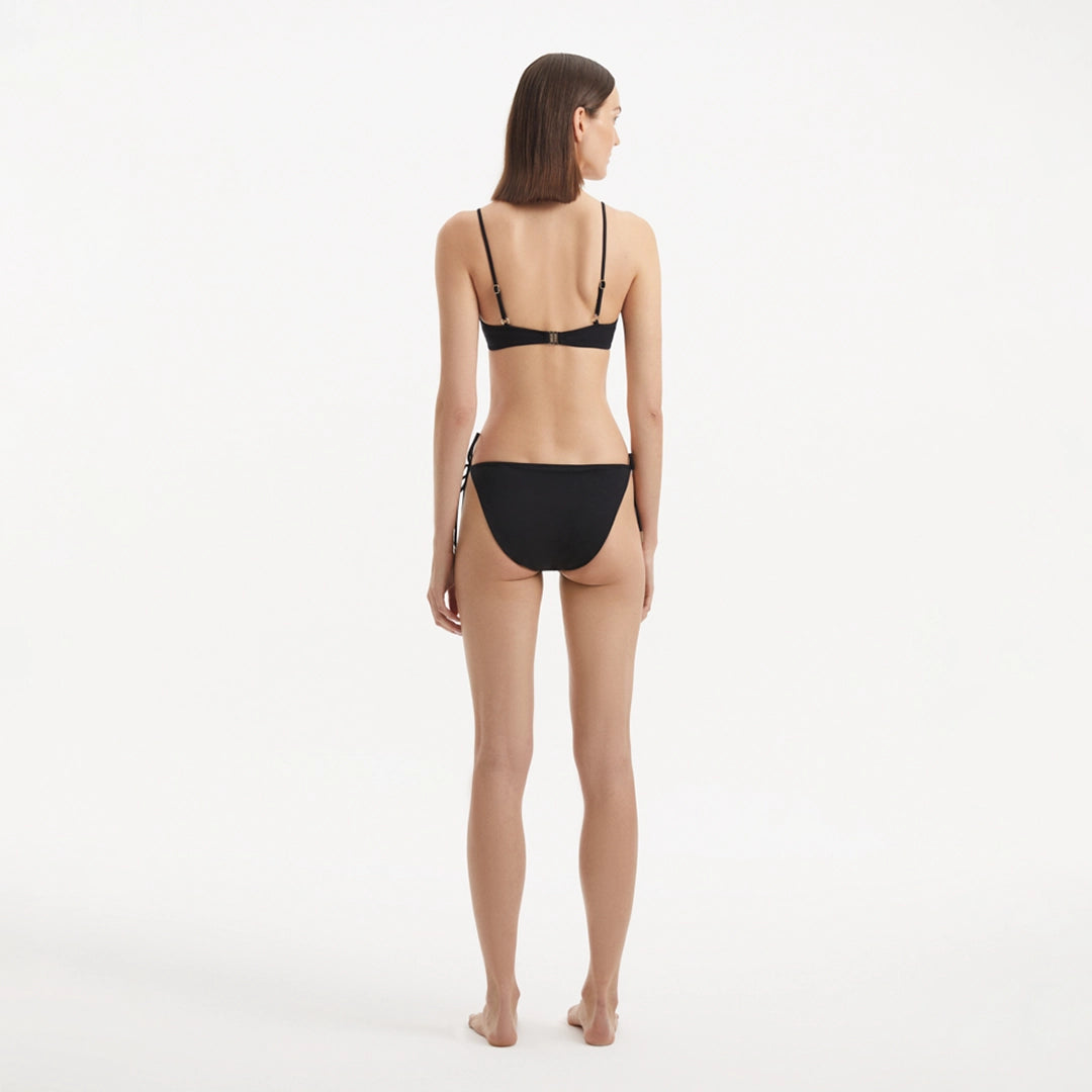 Salila Black Underwired Side Tie Wave Textured Bikini Set | Moeva | Bikini Set | Each week unveils new pieces—luxury swimwear, fluid resort silhouettes, and elevated summer-to-evening essentials designed to carry you from coastal escapes to city nights.