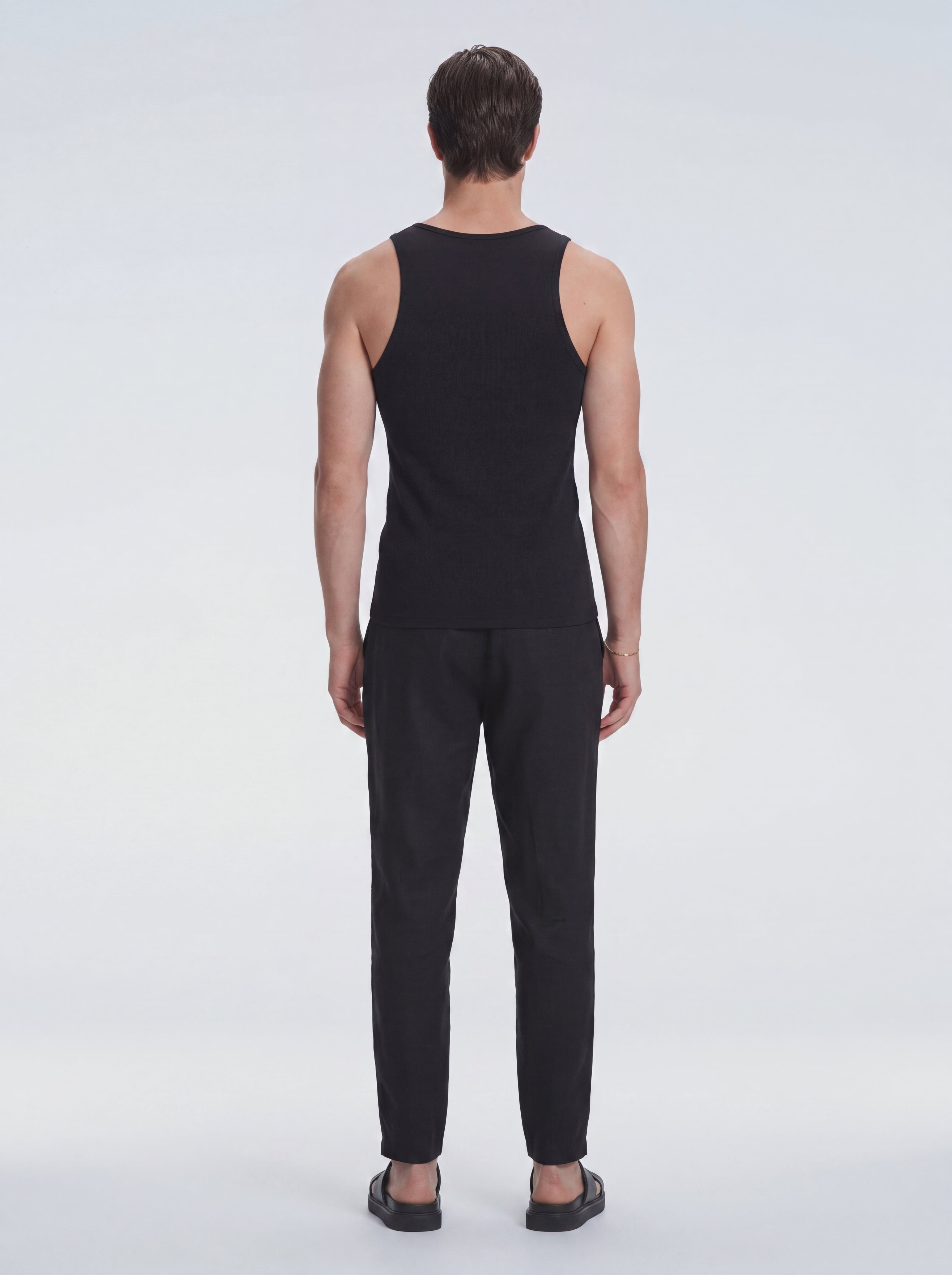 Phillip Black Tank Top | Moeva | T-Shirt | Each week unveils new pieces—luxury swimwear, fluid resort silhouettes, and elevated summer-to-evening essentials designed to carry you from coastal escapes to city nights.